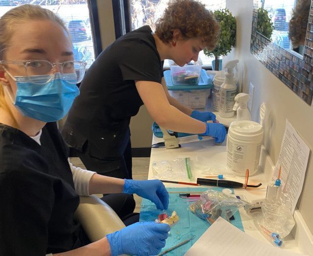 students creating dental molds in the lab